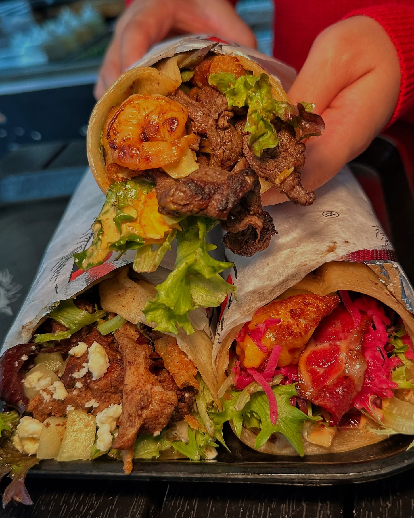 Premium wraps from Wolfnights® showcasing bold flavors and fresh ingredients—perfect example of modern QSR franchise appeal